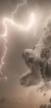 Transform your phone's background with this electrifying live wallpaper featuring a massive cloud bursting with lightning and epic clouds