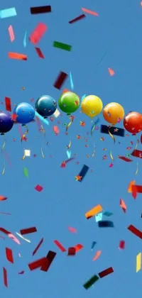 This phone live wallpaper features colorful balloons celebrating a birthday, depicted in vivid detail