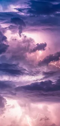 Experience the awe-inspiring beauty and power of nature with this captivating live wallpaper! Featuring a striking sky filled with fluffy clouds and crackling lightning, it's the perfect addition to your mobile device's background