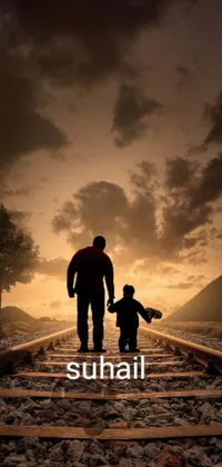 This phone wallpaper showcases a man and a child walking down a train track in a serene natural setting