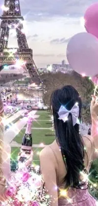 Looking for a whimsical and playful phone live wallpaper? Look no further than this charming design featuring two girls holding pink and white balloons in front of the Eiffel Tower, set against a Tumblr-style aesthetic