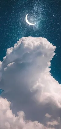 This mobile live wallpaper offers a magical and imaginative scene featuring a white cloud passing across a deep blue sky with stars