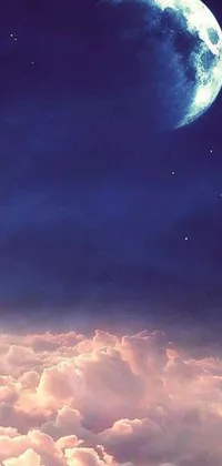 This mesmerizing phone live wallpaper portrays a radiant moon shining bright above the clouds, designed with a Tumblr-inspired style, utilizing digital art techniques