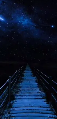This phone live wallpaper showcases a bridge leading to a dreamy star-filled sky, featuring digital art with bioluminescent elements
