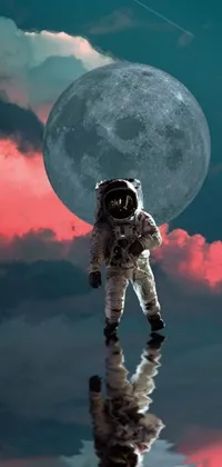 This phone live wallpaper features a silver space suit clad astronaut floating in water with a full red moon in the background