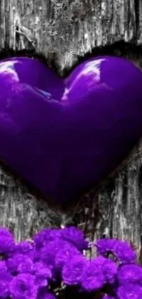 This purple heart live wallpaper showcases stunning flowers and romanticism