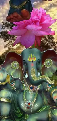 This live wallpaper features an intricately designed statue of an elephant adorned with a beautiful flower on its head