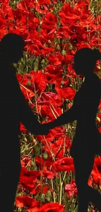 This exquisite live wallpaper features a stunning digital rendering of a couple holding hands in a vibrant field of red flowers