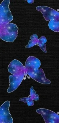 This is a beautiful and whimsical live wallpaper of blue and purple butterflies fluttering on a black background