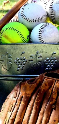 This dynamic phone live wallpaper features an eye-catching bucket filled with baseballs and a baseball bat against a vibrant, vintage glow background