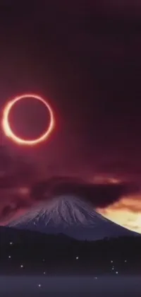 This stunning live wallpaper for your phone displays a hypnotic ring of fire set against a mountainous landscape