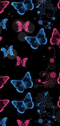 This mesmerizing phone wallpaper features a black background with pink and blue vector art butterflies