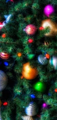 Get into the festive spirit with this stunning digital art live wallpaper featuring a close up of a Christmas tree in all its colourful glory