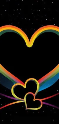 Get ready to add some color to your phone with this beautiful live wallpaper! This vector art features a vibrant rainbow heart on a sleek black background with a touch of aesthetic beauty from the stars