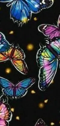 This stunning phone live wallpaper features a group of colorful butterflies on a black background