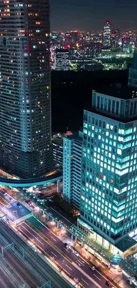 This stunning phone live wallpaper offers a breathtaking aerial view of a city at night