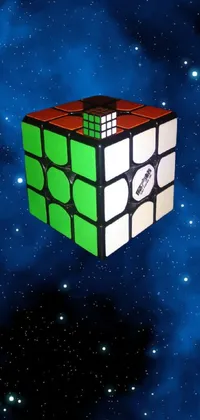 Get a stunning Rubik's Cube clock live wallpaper for your phone! With its vibrant colors and intricate design, this wallpaper pays homage to the famous puzzle creator