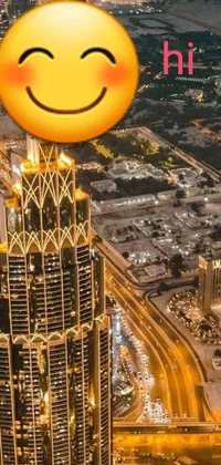 This live phone wallpaper showcases a tall building with a smiley face atop