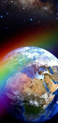 Are you looking to add some color and life to your phone screen? Look no further than this amazing live wallpaper! Featuring a breathtaking image of the earth with a vivid rainbow in the backdrop, this wallpaper is full of beautiful details of light and space that create a stunning visual experience
