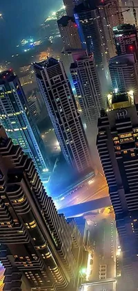This phone live wallpaper depicts a city at night, seen from the top of a high-rise building