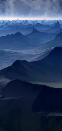This phone live wallpaper features a stunning view of a mountain range from a plane