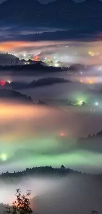 Experience the captivating beauty of a foggy valley at night with this stunning live wallpaper featuring a color field technique by Liu Haisu