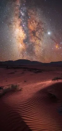 This live wallpaper displays a breathtaking desert landscape at night, with the Milky Way galaxy in the background