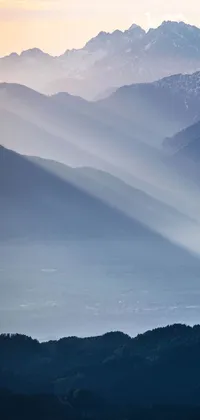 This captivating phone live wallpaper showcases a plane flying over a valley with mountains in the background, emitting a romantic and serene ambiance