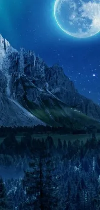 This phone live wallpaper features a serene mountain scene with a glowing full moon in the night sky