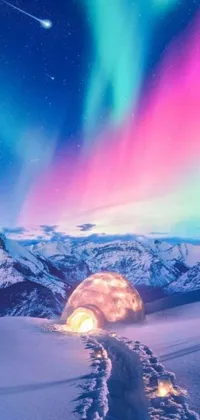 This stunning live phone wallpaper features a surreal snow-covered mountain illuminated by vibrant aurora lights