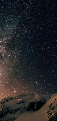 This mesmerizing night sky live wallpaper is a perfect choice to jazz up your phone