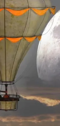 Get mesmerized by the surrealism and steampunk-inspired fantasy world of this hot air balloon and full moon live wallpaper for your phone