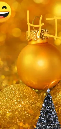 This phone live wallpaper features a golden Christmas ornament and a beautifully-decorated tree against a stunning background decorated with holiday accents