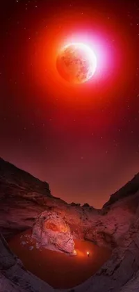This phone live wallpaper showcases a breathtaking red planet in the sky, created by Tumblr user Alexis Grimou