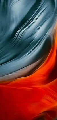 This live phone wallpaper showcases an abstract photograph of a woman donning an eye-catching red gown, set against the scenic and awe-inspiring Antelope Canyon