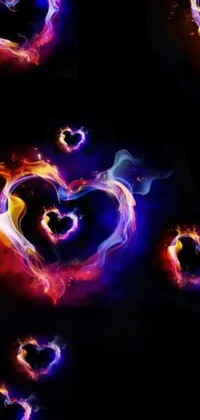 This phone live wallpaper features a stunning digital art piece of two glowing hearts, set in the dark