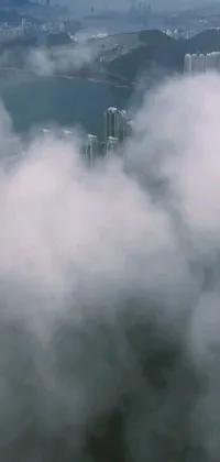 Get lost in the city in the clouds with this stunning live wallpaper for your phone