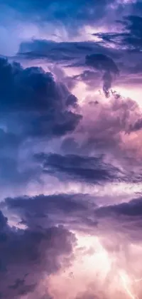 This live wallpaper is a stunning masterpiece featuring a sky filled with clouds and lightning
