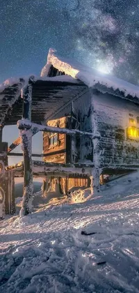 This phone live wallpaper features a charming log cabin situated amidst a snowy landscape