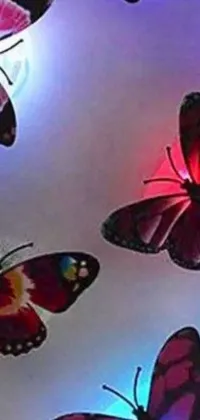 This enchanting phone live wallpaper showcases a group of brightly colored butterflies fluttering gracefully through the air