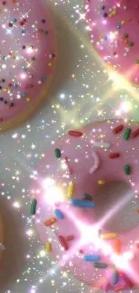 This phone live wallpaper features a stunning digital art design of a table overflowing with pink donuts smothered in sprinkles