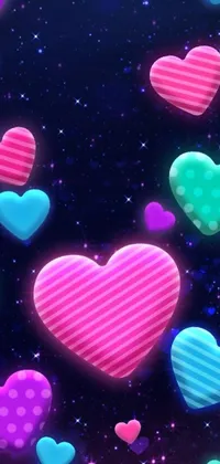 Enhance your phone's display with this stunning live wallpaper featuring a galaxy-themed background and floating heart designs