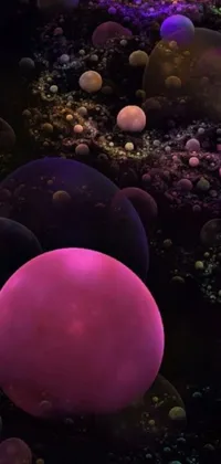 This vibrant live wallpaper boasts a multitude of balls of varying sizes and colors on a grassy field set against a dark, abstract cosmic background