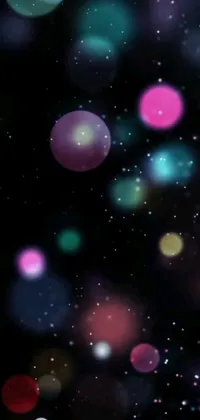 This live wallpaper features blurred lights on a black background, designed to resemble a galaxy