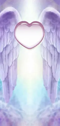 This live wallpaper features a digital art of two angel wings with a heart in the center, set against a light purple mist background