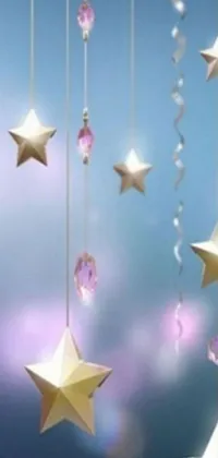 This live wallpaper for phone features a captivating digital art design of stars hanging from a string