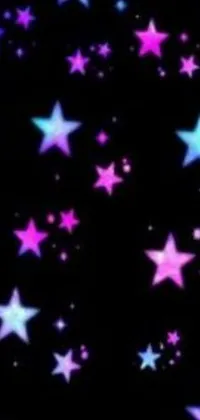 This stunning phone live wallpaper features a vibrant array of purple and blue stars set against a sleek black background, ideal for any Tumblr lover