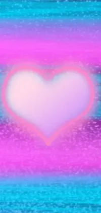 Get ready for some Y2K nostalgia with a phone live wallpaper featuring a colorful heart centered on a pink and blue background