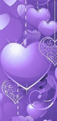This phone live wallpaper features a gorgeous array of purple hearts on a matching background