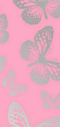 This phone live wallpaper features a beautiful design with a pink background and silver butterfly patterns, perfect for adding an elegant touch to your device